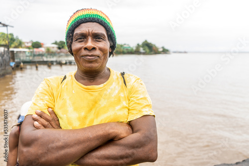 Black man originally from the caribbean of central america on the pier of Bluefields Nicaragua photo