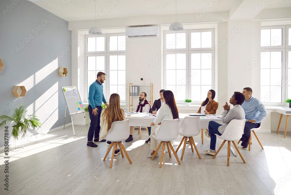 Different Races Meeting Mixed race business team having a corporate meeting. Multiracial group ...