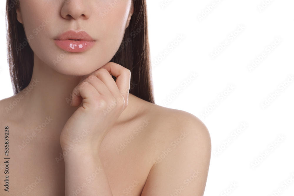 Closeup view of woman with beautiful full lips on white background Closeup view of woman with beautiful full lips on white background