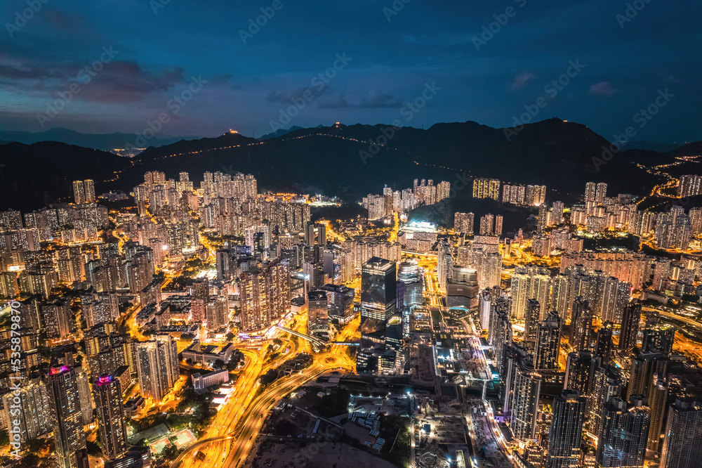 Epic night aerial view of the downtown of Kowloon, Towakwa and Hung Hom Area, Hong Kong