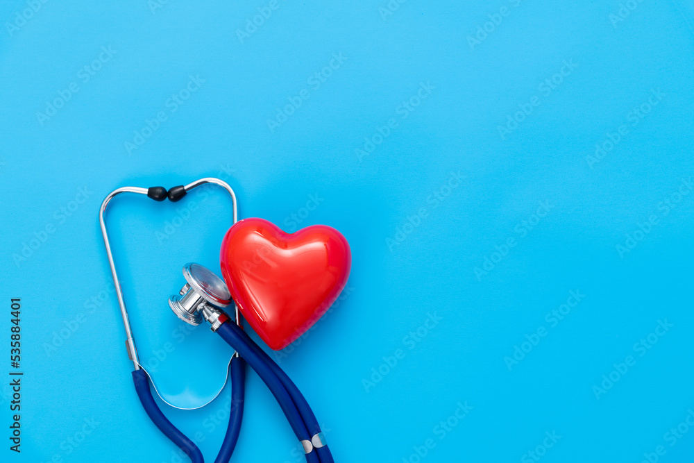 Stethoscope and red heart on blue background Stethoscope and red heart on blue background