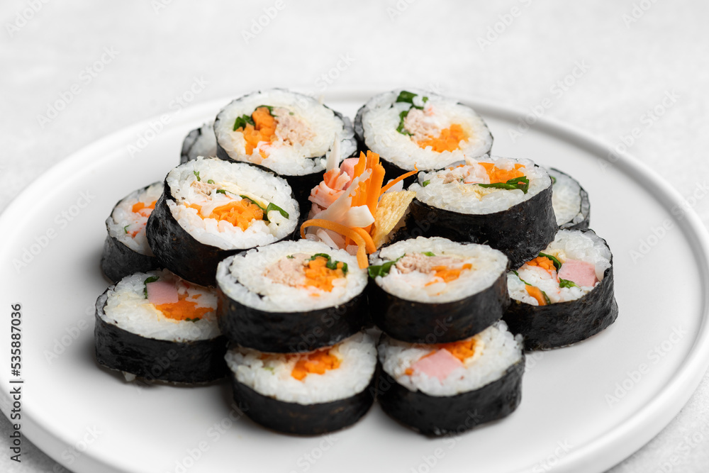 Gimbap or kimbap, korean rolls, traditional dish, selective focus Gimbap or kimbap, korean rolls, traditional dish, selective focus