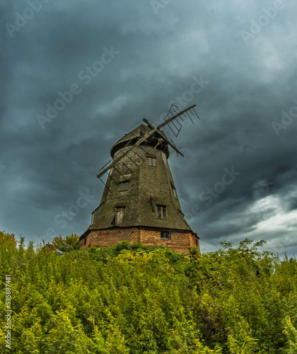 old windmill on the hill photo