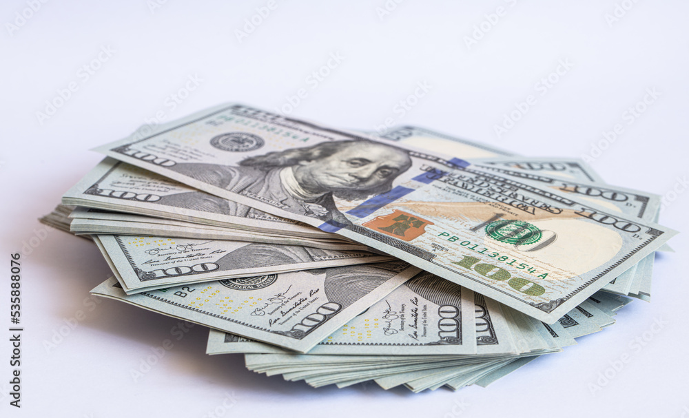 Pile of 100 dollar banknotes on white background Pile of 100 dollar banknotes on white background
