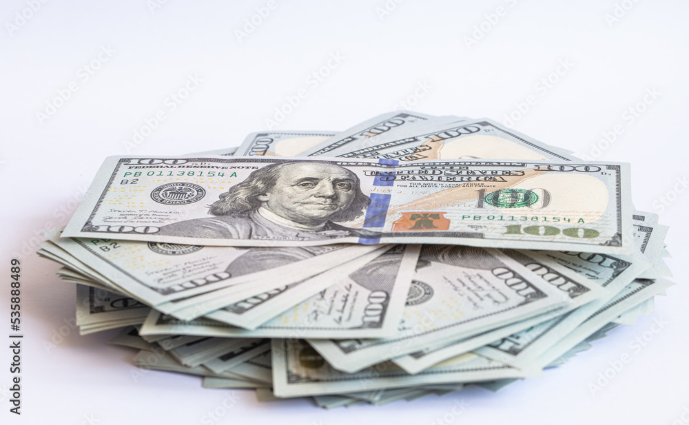Pile of 100 dollar banknotes on white background Pile of 100 dollar banknotes on white background