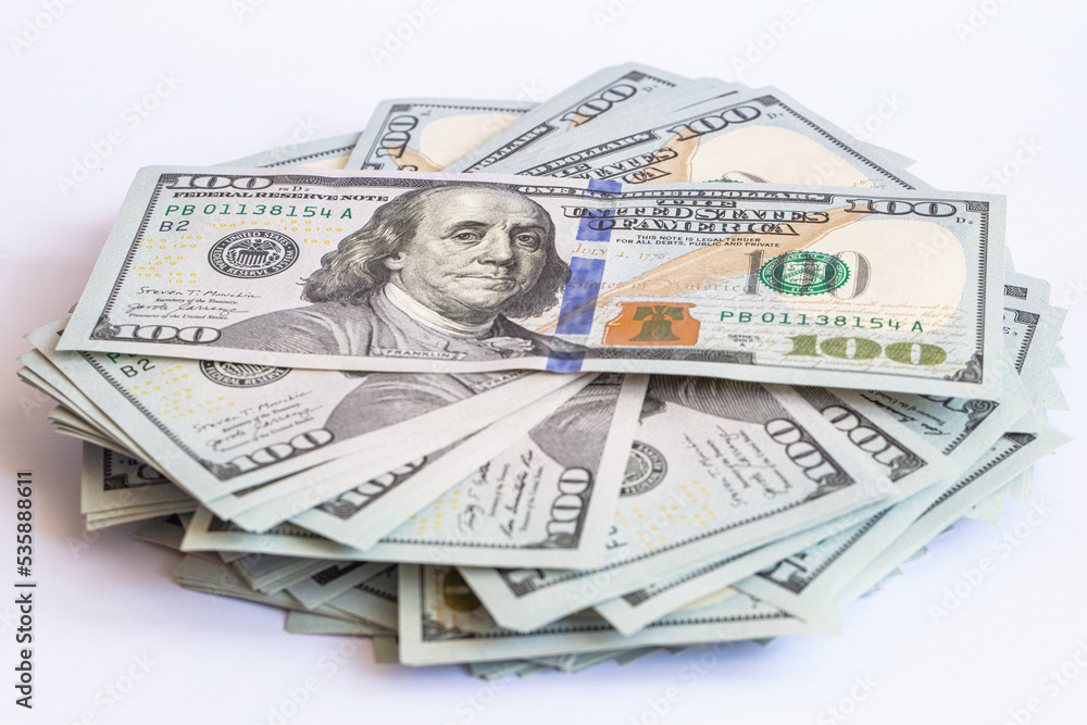 Pile of 100 dollar banknotes on white background Pile of 100 dollar banknotes on white background