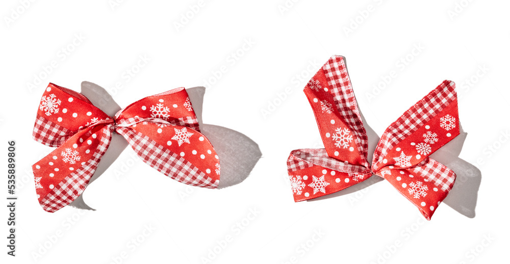 Red holiday bows on white background Red holiday bows on white background