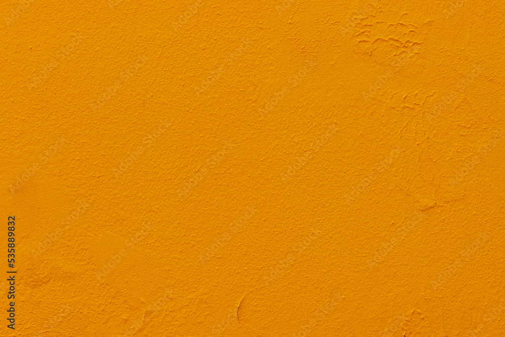 Abstract background of orange plaster on the wall. Abstract background of orange plaster on the wall.