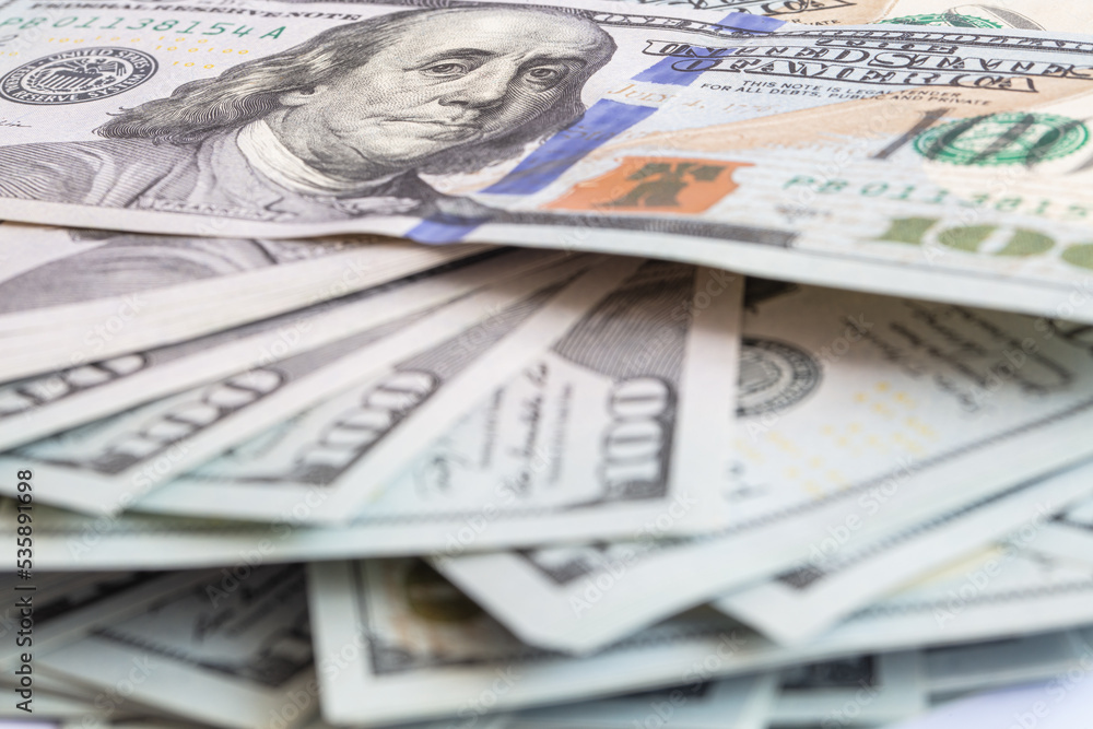 Pile of 100 dollar banknotes on white background Pile of 100 dollar banknotes on white background