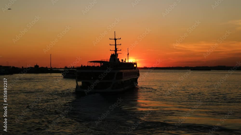 Silhouette of a moving ferry in sunset time of Istanbul Silhouette of a moving ferry in sunset time of Istanbul