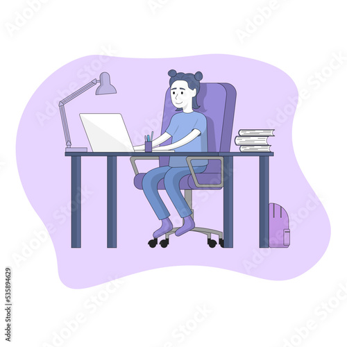 A little girl is sitting at a desk with a laptop and studying online