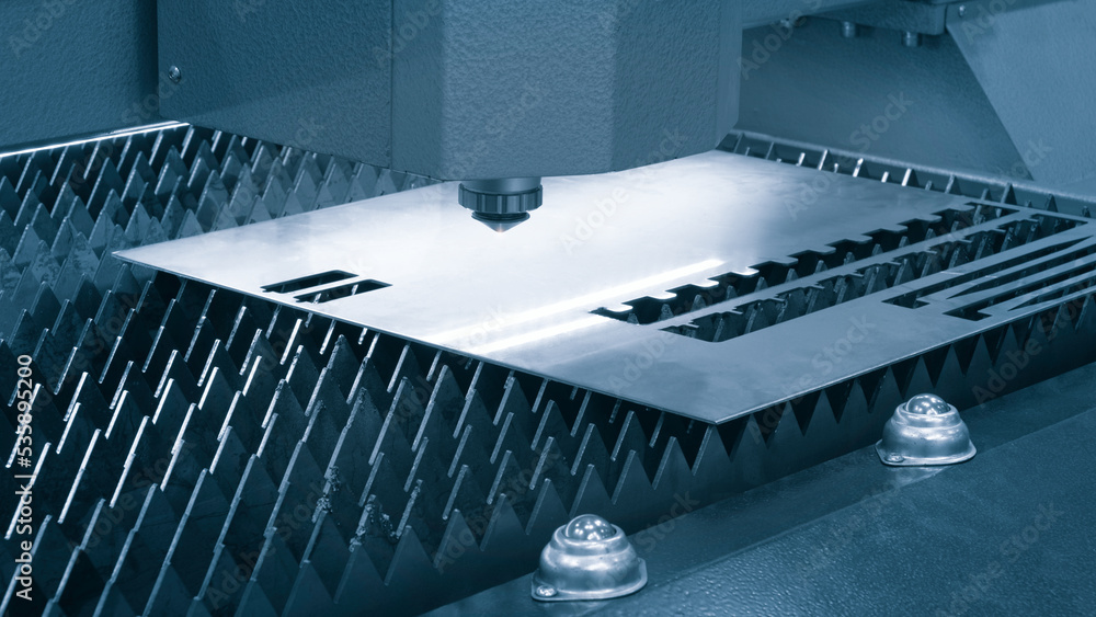 Cutting of metal with sparks fly from laser, modern industrial technology concept Cutting of metal with sparks fly from laser, modern industrial technology concept
