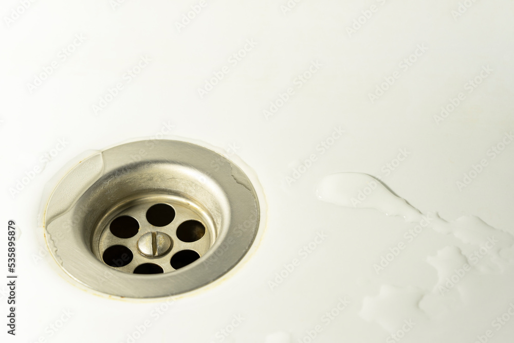 Drain metal round hole in the sink Drain metal round hole in the sink