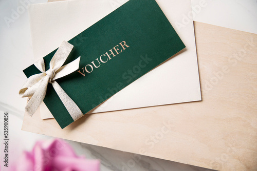 gift card voucher green golden bow business  photo