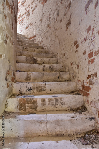 stone stairs in an abandoned building