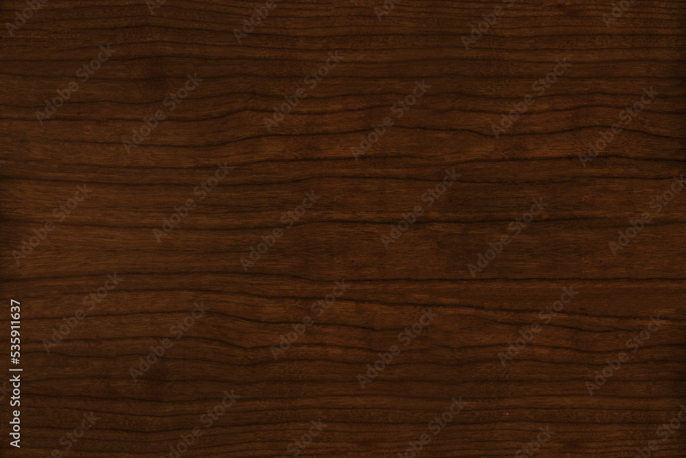 Dark brown figured quarter cut cherry wood veneer texture Dark brown figured quarter cut cherry wood veneer texture
