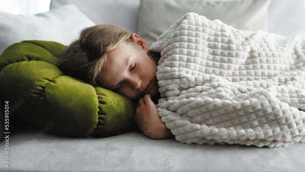Cute sweet girl sleeping in bed, having a sweet dream. Bedtime. Child kid sweetly sleeping in his crib. Relax and resting Cute sweet girl sleeping in bed, having a sweet dream. Bedtime. Child kid sweetly sleeping in his crib. Relax and resting