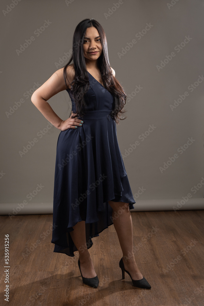wearing a long gala dress and high heels a young woman with long hair posing standing in studio, beauty and elegant fashion, outfit wearing a long gala dress and high heels a young woman with long hair posing standing in studio, beauty and elegant fashion, outfit