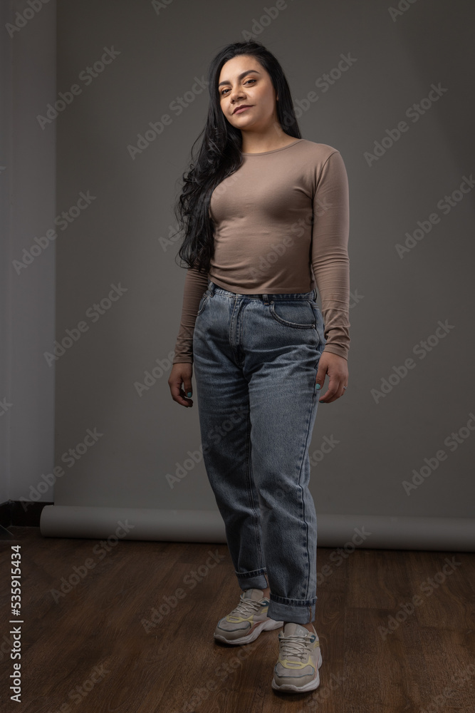 beauty details of latin woman wearing blouse with jeans in portrait, youth and casual fashion, person posing beauty details of latin woman wearing blouse with jeans in portrait, youth and casual fashion, person posing