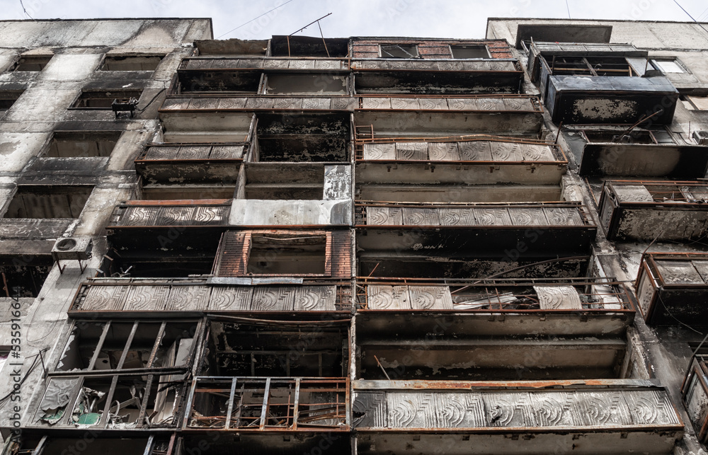 destroyed and burned houses in the city during the war in Ukraine