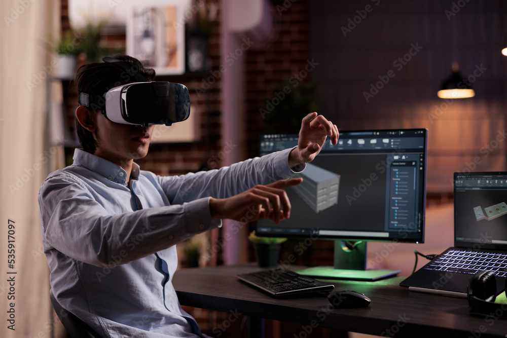 Cad engineer manufacturing industrial product using interactive vr goggles and computer. Engineering technical component with 3d software interface to develop science and industry production. Cad engineer manufacturing industrial product using interactive vr goggles and computer. Engineering technical component with 3d software interface to develop science and industry production.