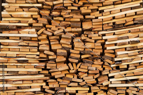 stack of firewood in countryside as a textured background