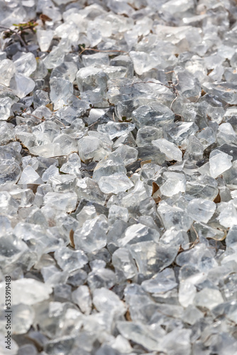 Wallpaper Mural Background from a transparent glass stone. Artificial turf. Pieces of glass. Pure crystal quartz Torontodigital.ca