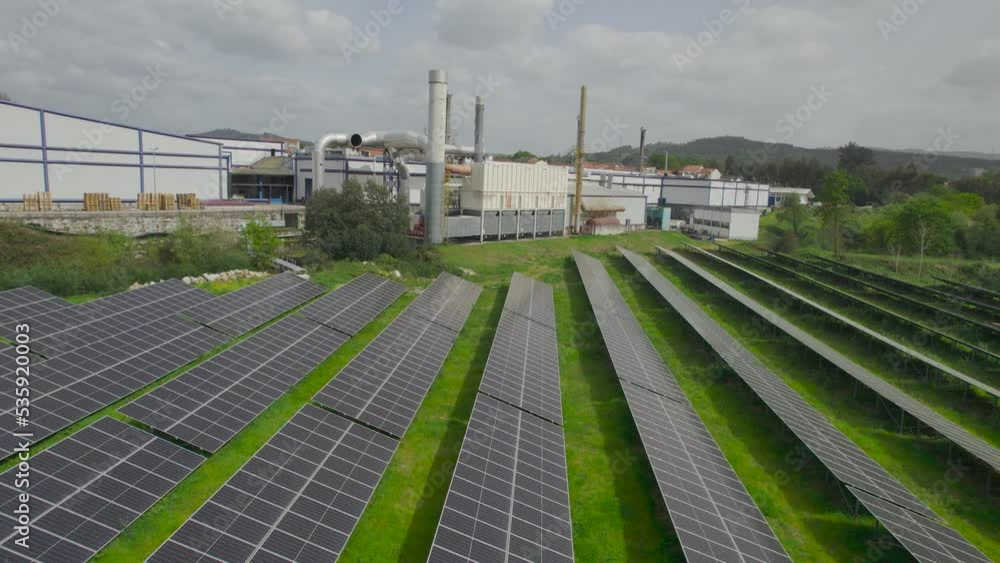 Solar Panels Energy System Aerial View. Alternative Energy. Solar panels on the ground. Rows of Solar Panels Installed on Field. Solar Panels Energy System Aerial View. Alternative Energy. Solar panels on the ground. Rows of Solar Panels Installed on Field.
