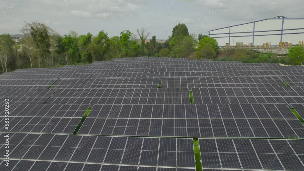 Solar Panels Energy System Aerial View. Alternative Energy. Solar panels on the ground. Rows of Solar Panels Installed on Field. Solar Panels Energy System Aerial View. Alternative Energy. Solar panels on the ground. Rows of Solar Panels Installed on Field.