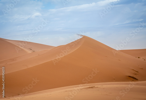 Desert landscape. Merzouga desert  the door to Sahara  in Morocco.  Desert dunes. Africa landscape background. Travels backgrounds.