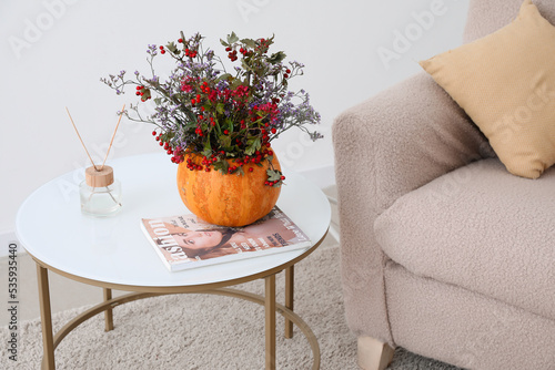Pumpkin with autumn flowers...