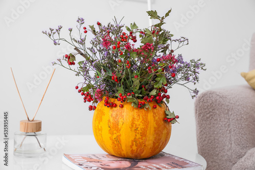 Pumpkin with autumn flowers...