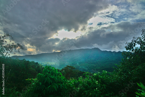 awesome shining sun at the mountain
