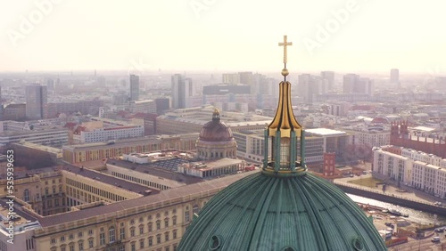 Aerial view of the Berliner dome cathedral in the Museuminsel and Humboldt Forum, Berliner Schloss in the background in Mitte, Berlin, Germany photo