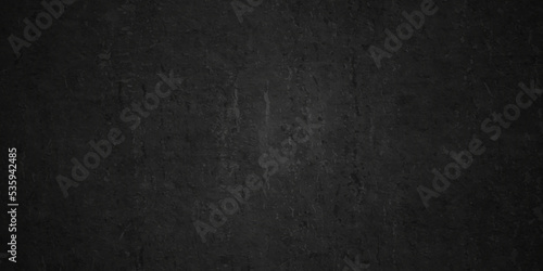 Dark black grunge textured concrete background. Panorama dark grey black slate background or texture. Vector black concrete texture. Stone wall background.	
