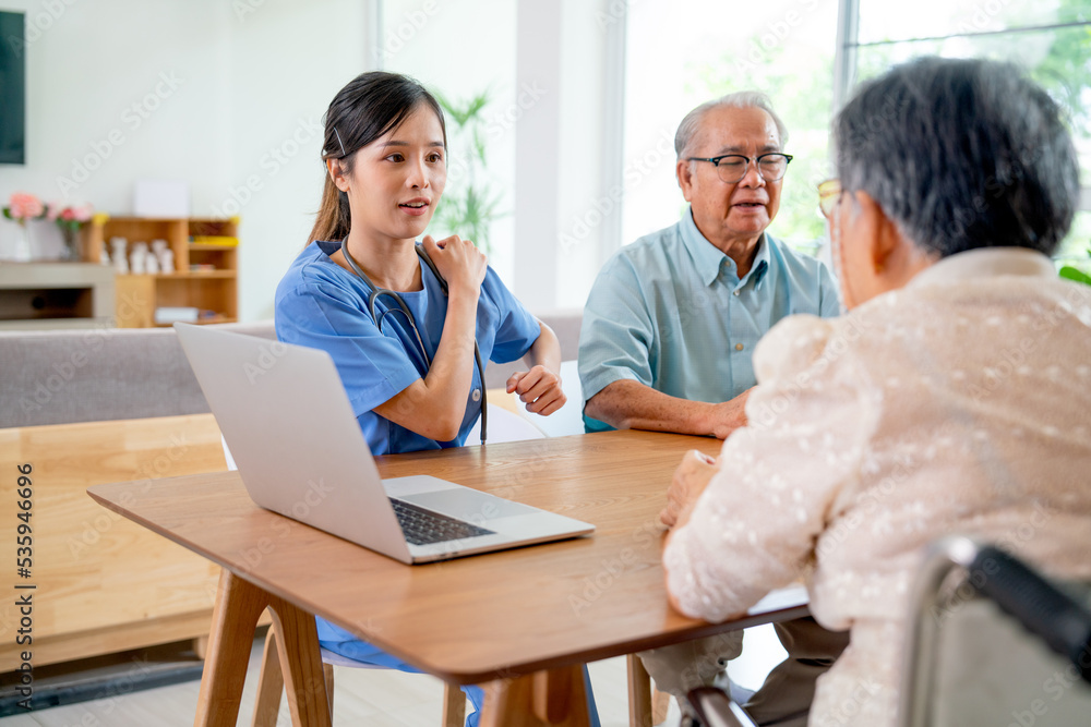 Pretty Asian young nurse or doctor explain and give consult information about shoulder pain to senior woman during discuss about health care of elderly patient. Pretty Asian young nurse or doctor explain and give consult information about shoulder pain to senior woman during discuss about health care of elderly patient.