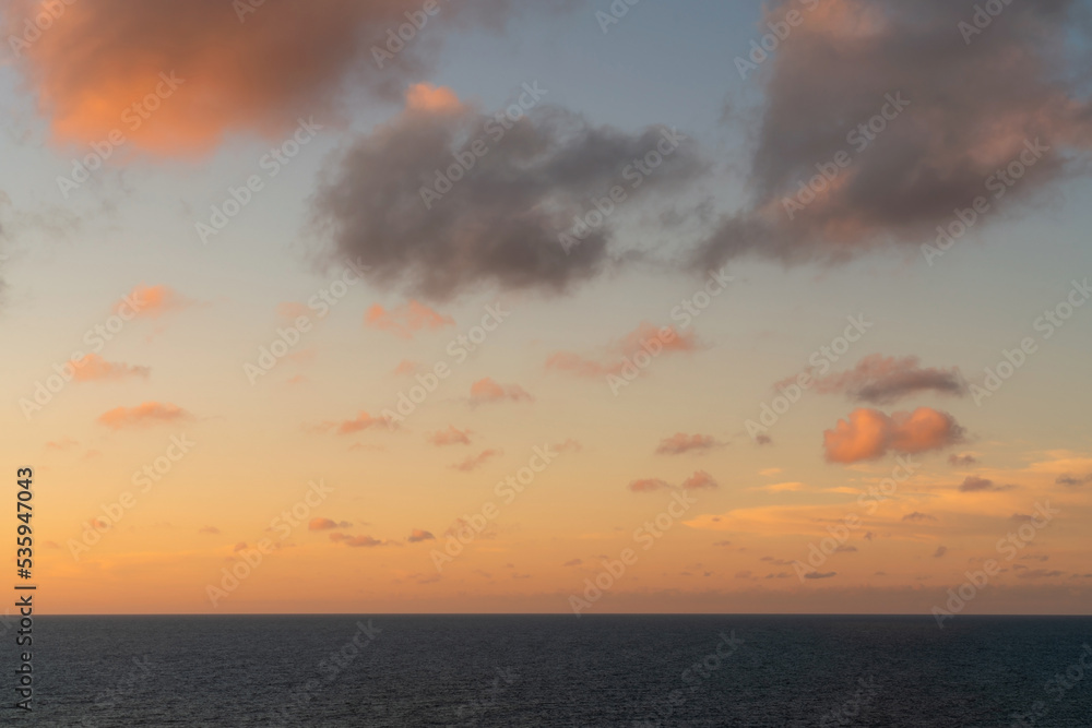 Pink sunset sky with clouds over the Baltic Sea, Svetlogorsk, Kaliningrad region, Russia Pink sunset sky with clouds over the Baltic Sea, Svetlogorsk, Kaliningrad region, Russia