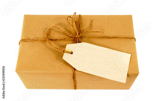 Brown paper parcel and label or gift tag small single one isolated transparent background PNG file