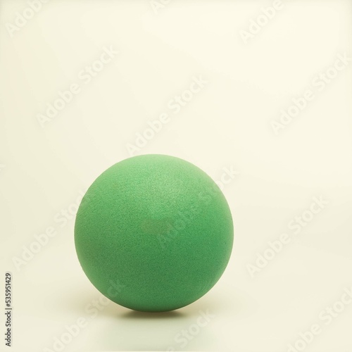 Colorful foam ball isolated against white background with ample advertising space.