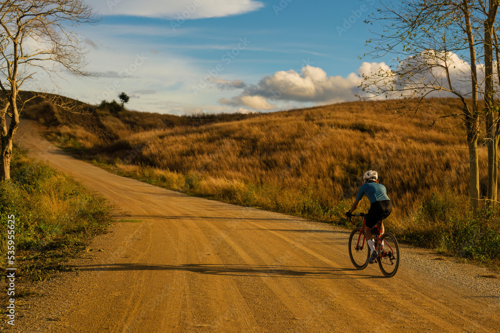 Obraz premium Cyclists practicing on gravel roads.