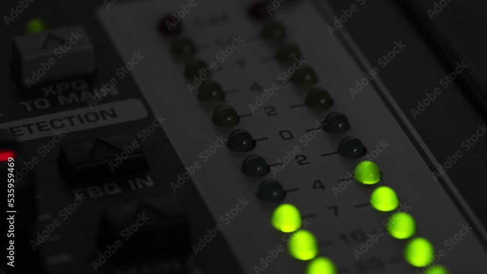 LED indicator of sound level signal on the mixing console. Closeup