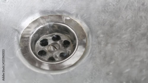 draining water at sink