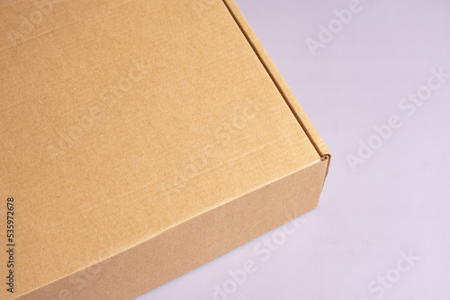 brown cardboard box isolated on white background, close up