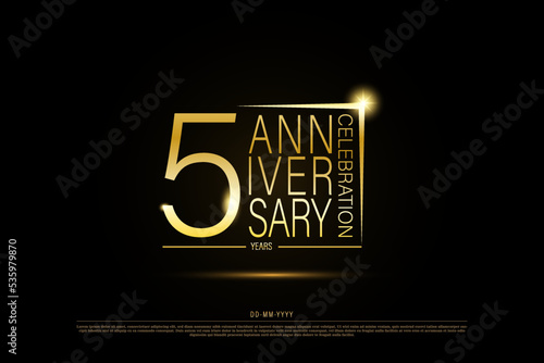5 years anniversary golden gold logo on black background, vector design for celebration.