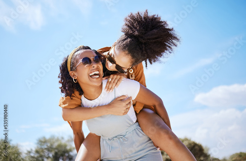 Freedom, friends and black women at a beach, crazy and having fun with carrying joke in nature. Summer, travel and happy ladies being silly, laughing and playing, positive energy and friendship