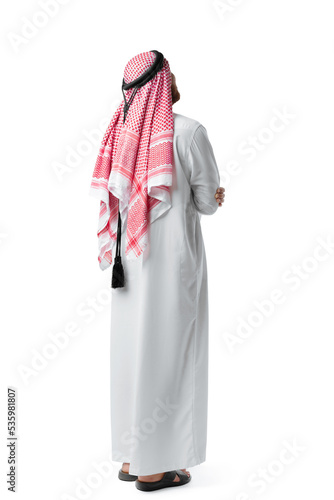 Obraz na plátne Back view of an Arab man standing on white isolated background