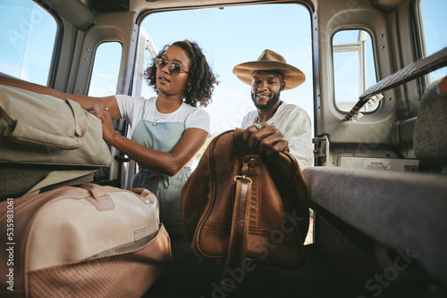 Fotografiet Black couple, travel and packing for road trip, journey or adventure with bags together