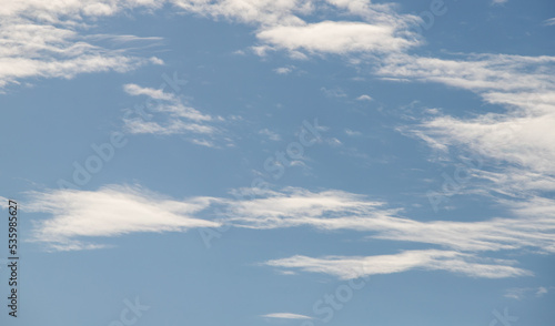 Blue sky with white clouds. Sky background.