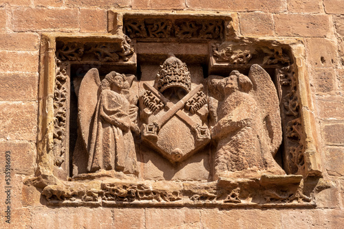 Relief on the facade with shield and angels. Monastery of Santa Maria la Real. Najera, La Rioja, Spain. Santiago's road. photo