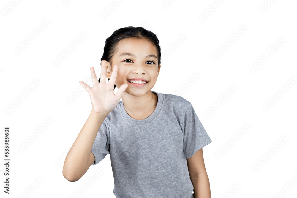 Close up Asian little girl smiling happy positive attractive waving hand greeting say hi hello with clipping path. studio portrait. Close up Asian little girl smiling happy positive attractive waving hand greeting say hi hello with clipping path. studio portrait.